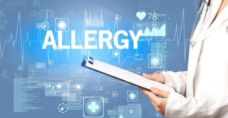 young doctor writing down notes