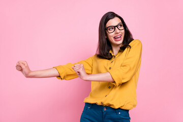 Photo of funky brunette hairdo young lady dance wear yellow shirt eyewear isolated on pink color background