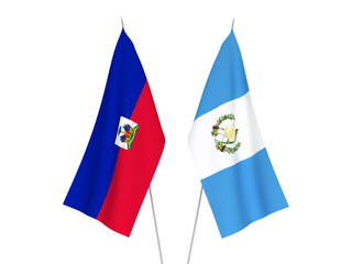 National fabric flags of Republic of Guatemala and Republic of Haiti isolated on white background. 3d rendering illustration.