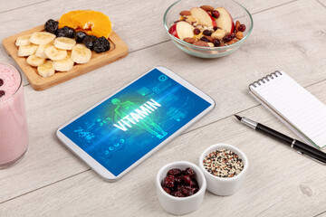 Tablet Pc with fruits, medical concept