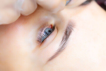 half-done work of permanent eyelid makeup light shading