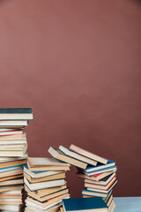 Stacks of Books for College School Library Training Brown Background