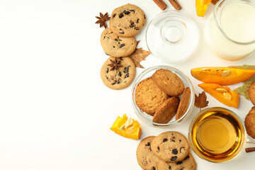 Concept of tasty food with pumpkin cookies on white background