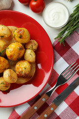 Concept of tasty food with baked potato on white background
