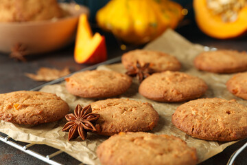 Concept of tasty food with pumpkin cookies, close up