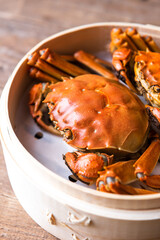 Chinese hairy crabs in bamboo steamer, chinese cuisine