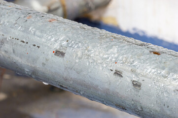 Condensed water on the steel pipe.