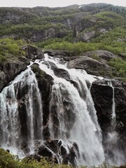 Fototapeta na wymiar Waterfall in norwegian nature 