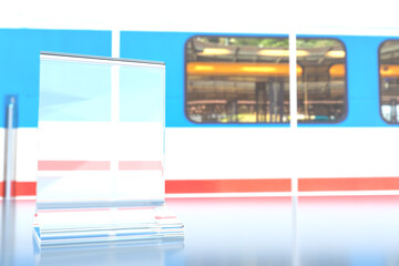 Empty transparent table plate on the background of the train carriage. Template for information on the topic of travel.