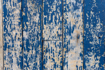 Colourful distressed wooden texture background painted blue
