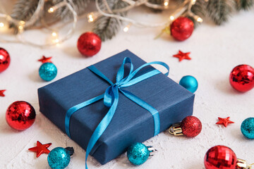 Christmas Gifts for Men. Dark Blue Gift box on Christmas background. Happy New Year.
