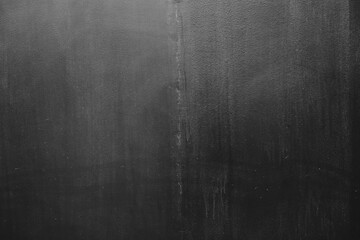 Dark gray plaster finish on concrete wall