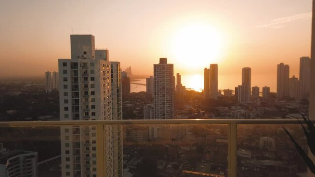 Panama City sunrise over the ocean.  Central america booming residential district.