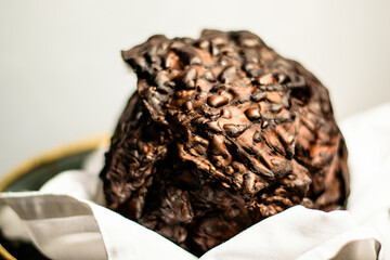 Burned cabbage in a metal plate at a restaurant