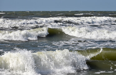 Waves running with foam in the Baltic Sea