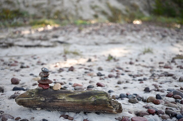 Balanced Pebbles Pyramid on the Beach
