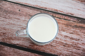 white milk drink in a glass mug