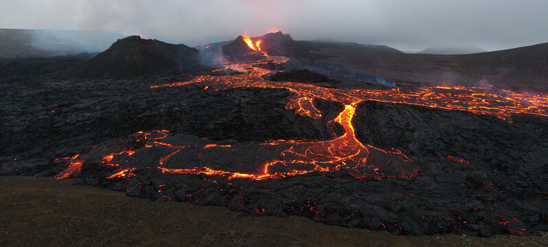 volcano erupting from aerial point of view in panoramic