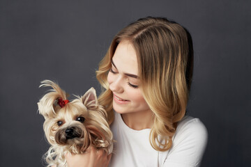 pretty woman with a small dog makeup posing cropped view