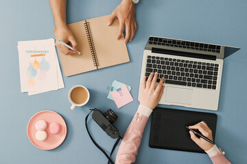 Creative professional designer's desk from above