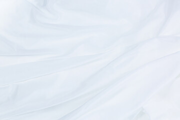 White cloth background abstract with soft waves,Closeup elegant crumpled of white silk fabric cloth background and texture. Luxury background design.