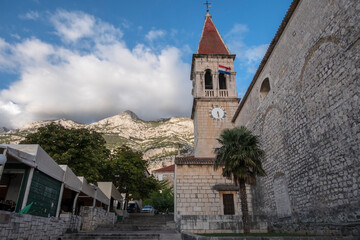 Fototapeta na wymiar Makarska, Croatia, St. Mark's Church in the center of town.