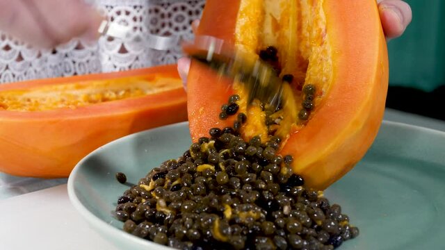 Fresh fragrant papaya pulp. Appetizer vegan sweet food. Tropical fruit