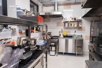 Restaurant kitchen. kitchen of operating restaurant without people. Concept - equipment for...