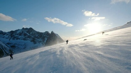 Mountaineer group trekking on slope mountain with blizzard - Powered by Adobe