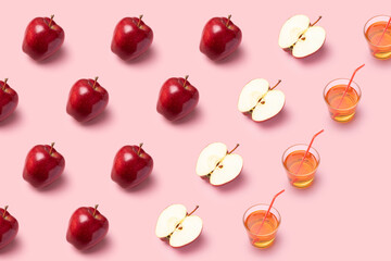 Red apples and juice on pink background. Pattern, top view, flat lay.