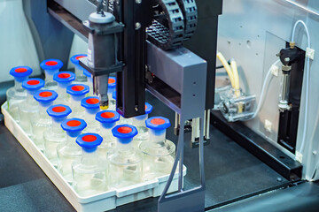 Pharmacological production. Medicines production process. Equipment for filling glass tubes. Equipment automated pharmaceutical factory. Manufacturing medicinal products. Automated equipment for lab
