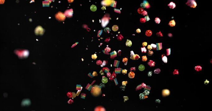 Bright multicolored sweets in slow motion