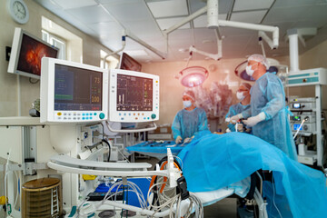Surgery clinic operating surgical disease. Professional medical emergency surgeons working in ward.
