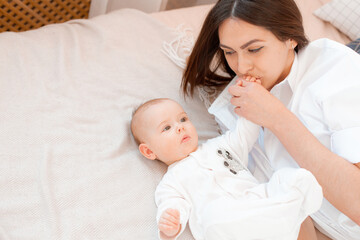 mother and baby in bedroom