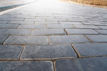 Obraz premium Gray stone pavement and front light.