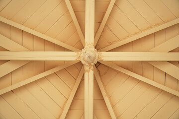 Fragment of elements of the ceiling of a street gazebo.