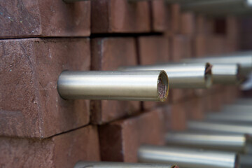Close-up of circular construction material made from re-used waste plastics on a recycling plant