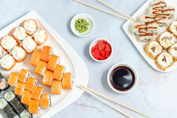 sushi rolls on a white plate on a white background