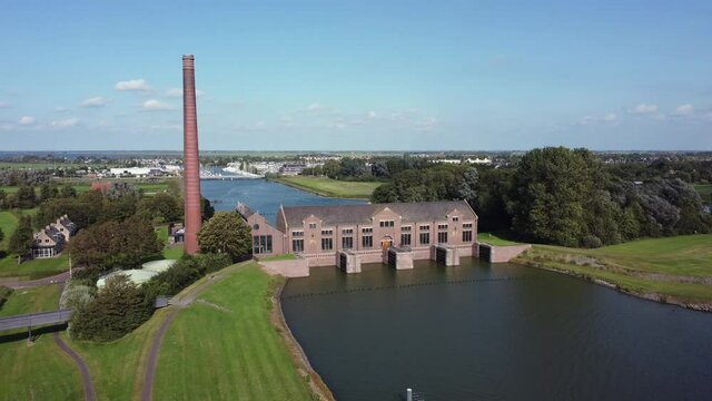 The Woudagemaal is the largest steam pumping station ever built in the world. Located in Lemmer in the Netherlands, aerial backwards