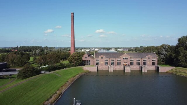 The Woudagemaal is the largest steam pumping station ever built in the world. Located in Lemmer in the Netherlands, aerial left to right