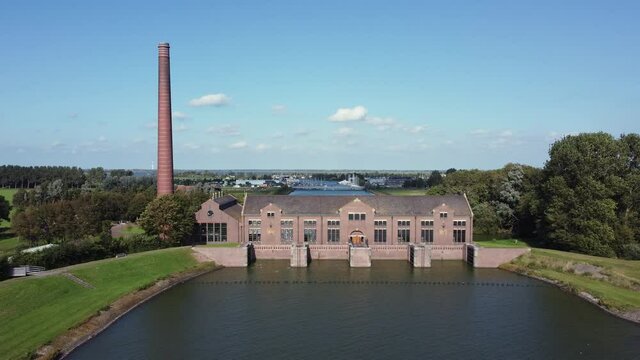 The Woudagemaal is the largest steam pumping station ever built in the world. Located in Lemmer in the Netherlands, aerial right to left