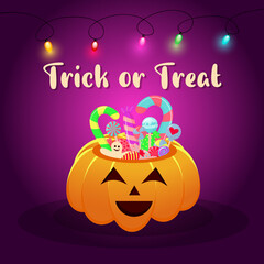 Halloween pumpkin basket full of candies and sweets with garland. Trick or treat lettering.