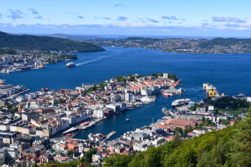 Fototapeta na wymiar Aerial bird view of Bergen city and harbour with ferry entering the port