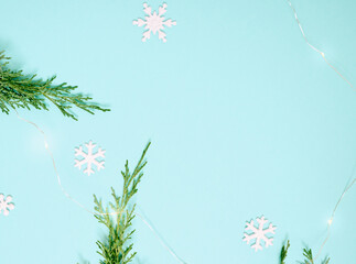 Christmas background. Top view of Christmas decorations. Flat lay of creative design on blue background. Copy space for text.