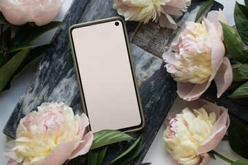 phone  mockup with peonies and marble