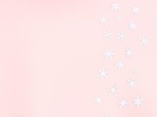 Christmas ornament with snowflakes on blue background.