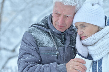 Close up portrait of sad senior couple