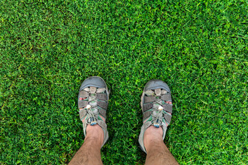 Hiker on a grass with first person perspective view