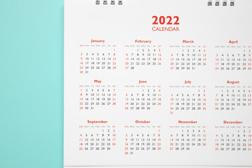 2022 calendar page on blue background business planning appointment meeting concept