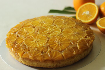 Home baked Orange upside down cake with orange slices on the top